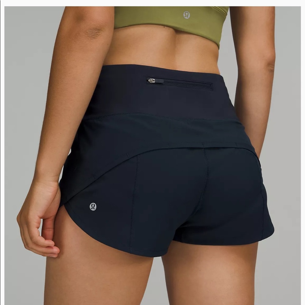 Lululemon navy blue speed up mid rise shorts size 2